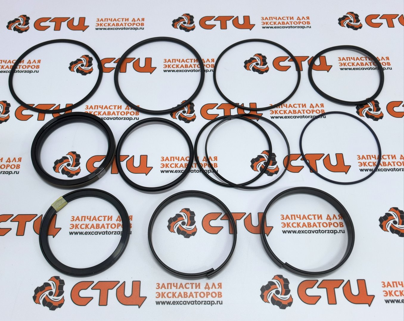 Ремкомплект AH212101 (World Gasket, Italy) поршня гидроцилиндр опрокидывания переднего ковша и экскаваторного ковша экскаватора погрузчика John Deere 315SK, 325J, 325K
